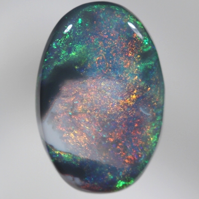 SOLID BLACK OPAL Unusual pattern, burning red bordered by black opal and sparkling green